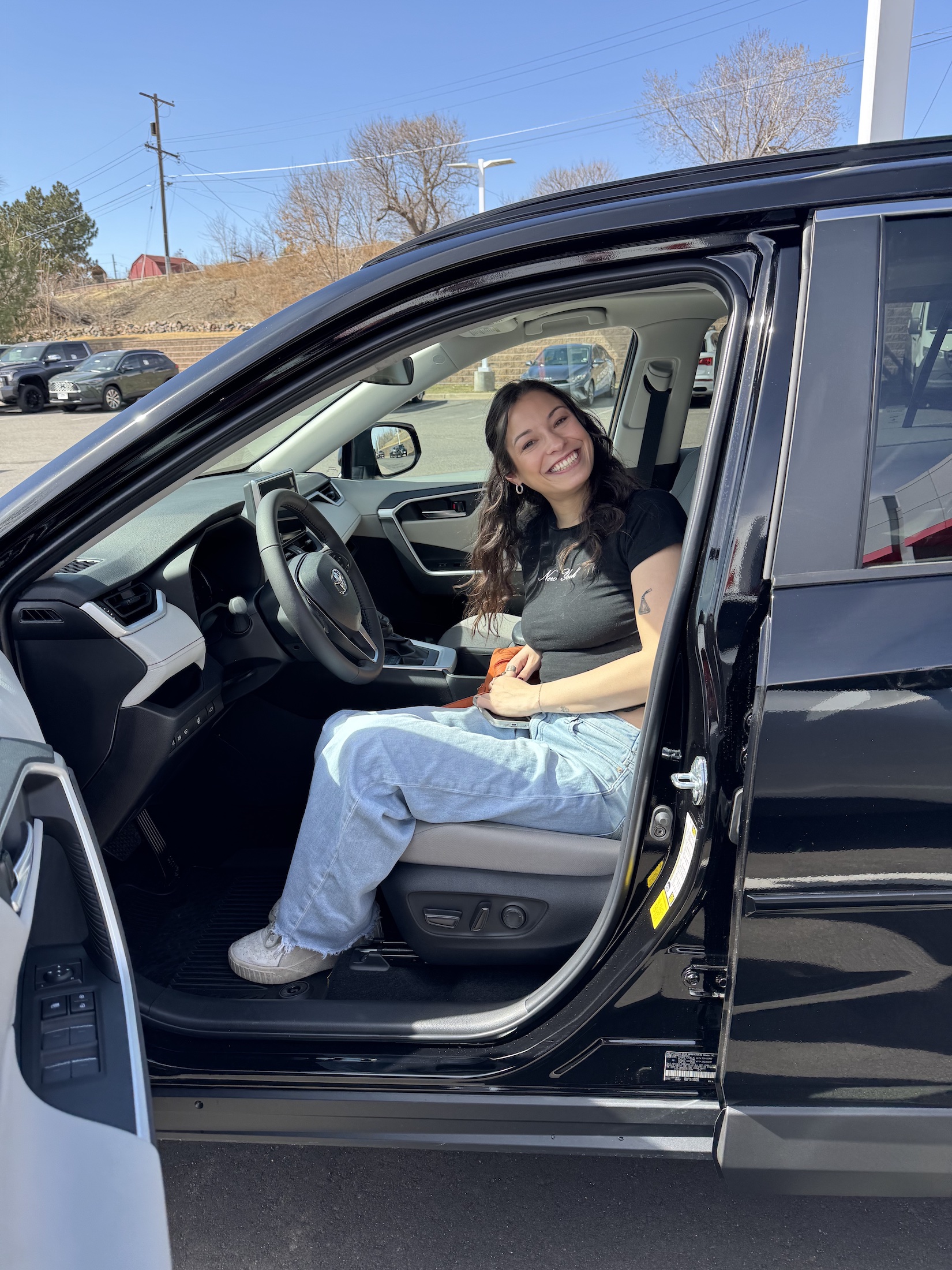 Erin in her new car!